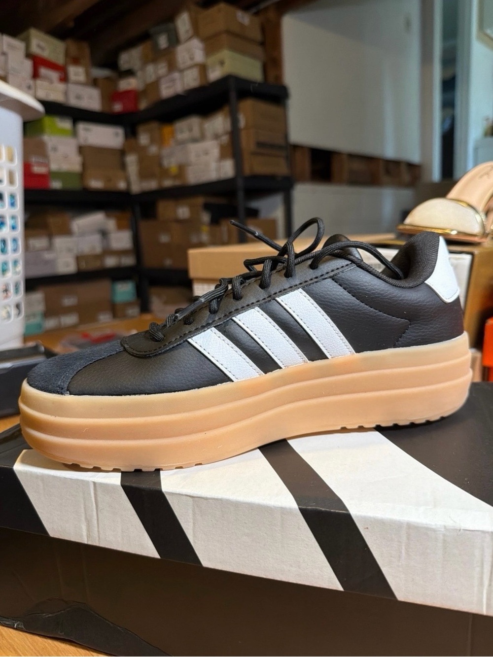 adidas Women’s Black Leather-Look Platform Sneaker with White Stripes